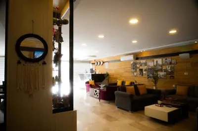 a living room with a couch and a table at Corner View Hotel in Wadi Musa