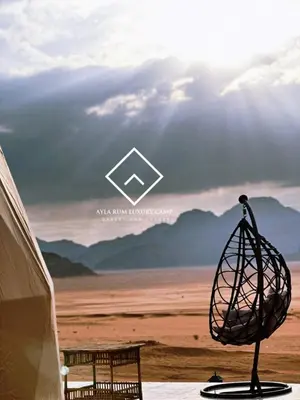 a bird cage sitting on top of a table at ALYA RUM LUXURY Camp in Wadi Rum