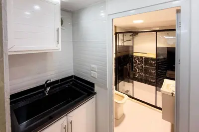 a small bathroom with a sink and a toilet at Rose In Apartment in Wadi Musa