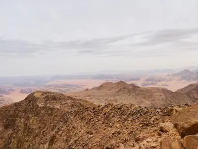 a view of the desert from the top of a mountain at Desert Key Camp in Wadi Rum