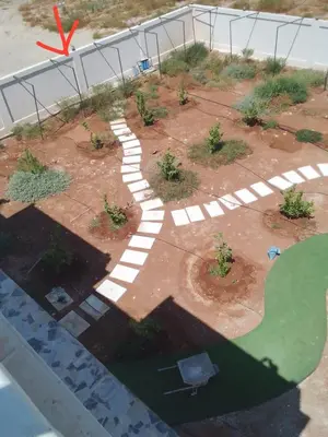 an aerial view of a garden with a walkway at Rest Sea Chalet shearing Room one bed
