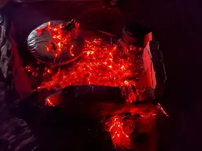 a close up of a fire hydrant with red lights at Wadi Rum Wanderer cmap in Wadi Rum