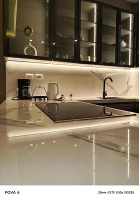 a kitchen with a sink and a counter top at Al yaqoot apartment in Amman