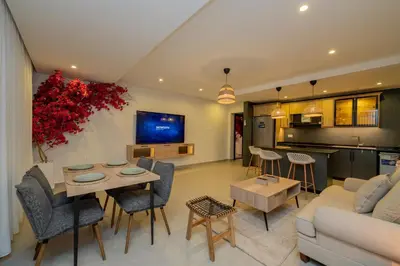 a living room with a couch and a table at Maria Suites 1 in Aqaba