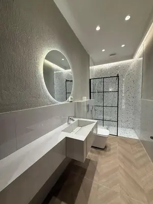 a bathroom with a sink and a toilet at amazing rooftop studio at abdoun 702 in Amman