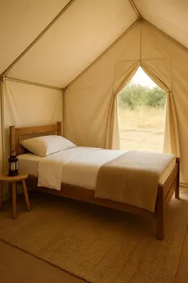 a bedroom with a bed in a tent at 1moon valley camp in Al Jafr