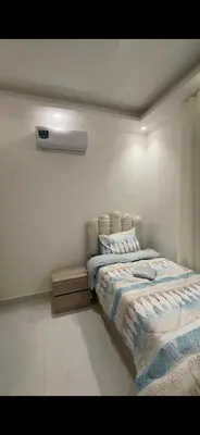 a bedroom with a bed in a room at 2 bedroom studio - Fully furnished in Irbid
