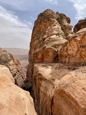 a view of a canyon in the desert at Nadina Bedouin home in Petra