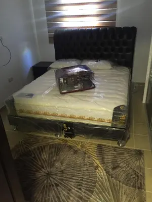 a bed in a room with a mattress on a floor at شقة مفروشة للإيجار بالرابية بالقرب من السفارة الصينية in Amman