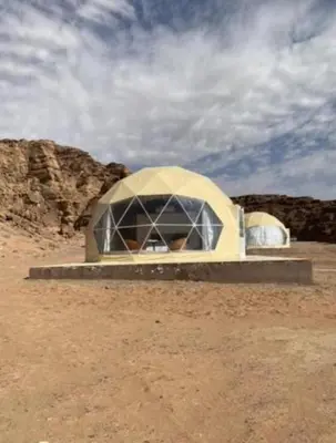 a tent in the middle of the desert at Jorye Rum luxure cam in Wadi Rum