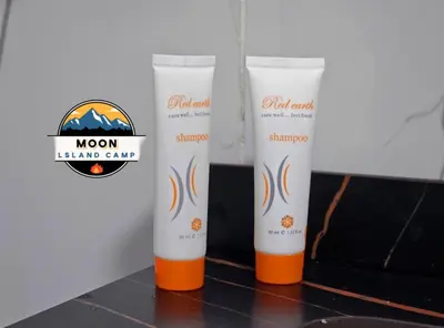 a couple of bottles of sunscreen sitting on a counter at MOON ISLAND lUXURY CAMP in Wadi Rum