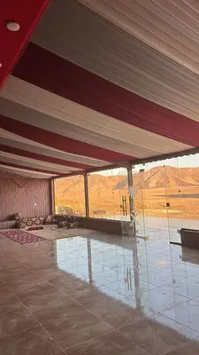 a large tent with a view of a field at Wadi Ram camp in Disah