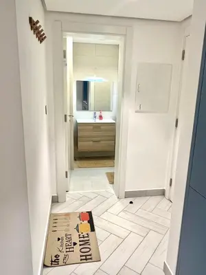 a bathroom with a sink and a mirror at Ayla in Aqaba