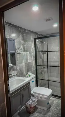 a bathroom with a toilet and a sink at BUBBLES CAMp in Wadi Rum