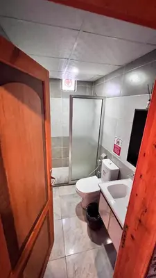 a bathroom with a toilet and a sink at Wadi Rum Desert Memory in Wadi Rum