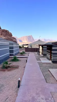 a pathway leading to a building in the desert at Wadi Rum Desert Memory in Wadi Rum