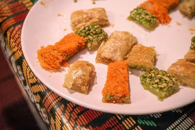 a white plate of food on a table at Rum Cave Tours in Wadi Rum