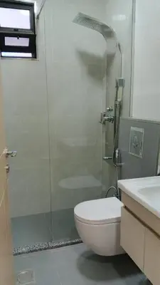 a bathroom with a shower and a toilet and a sink at hotel amman in Amman