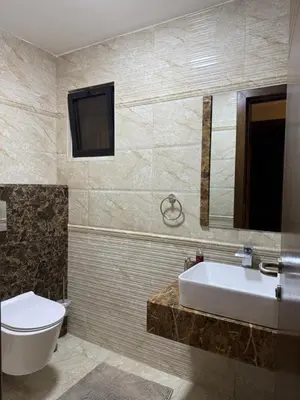 a bathroom with a sink and a toilet at مطر in Amman