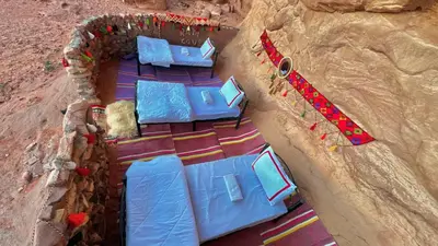 an overhead view of a group of blue couches at Magic Cave Night Tours in Wadi Rum