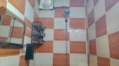 a view from above of a shower on a wall at Stone house in Amman