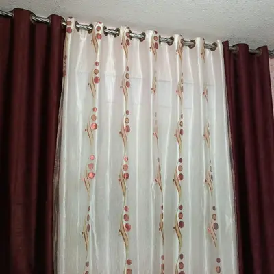 a curtain with cherries on it in a room at المناره هاوس in Wadi Musa