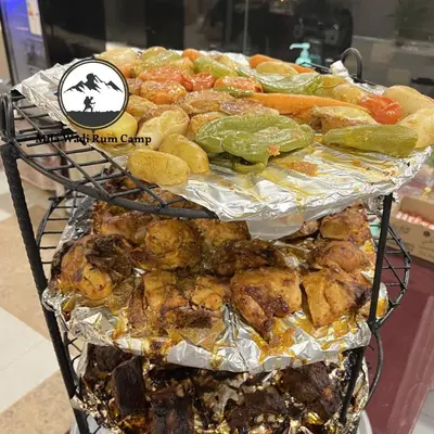 a bunch of food on top of a rack at Mila Wadi Rum Camp in Wadi Rum