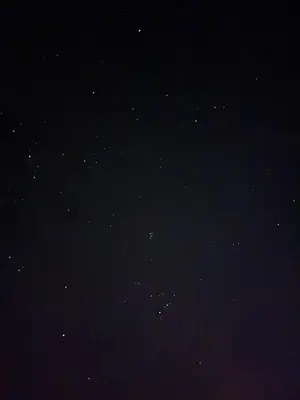 a night sky filled with lots of stars at Lozi House Cozy Stay in Al Azraq ash Shamālī