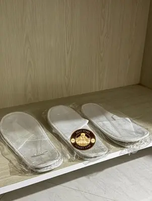 a pair of flip flops sitting on a shelf at DESRT STARS lUXURY CAMP in Disah