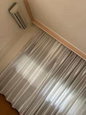 a room with a ceiling with a window and a radiator at Rasheed pearl in Amman