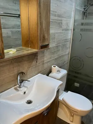 a bathroom with a sink and a toilet at Wadi Rum Star Sky in Wadi Rum