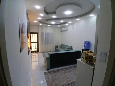 a living room with a couch and a ceiling at شقق السعادة 2 in Amman
