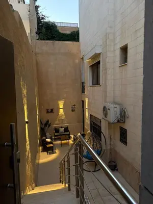 a view of a hallway in a building at شقة مميزة في عبدون -Special apartment in Abdon in Amman