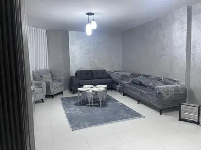 a living room with a bed and a couch at jordanien madaba in Madaba