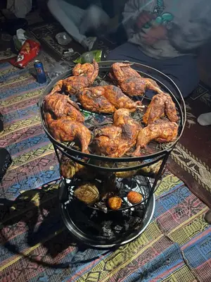 a bunch of food in a basket on a table at Wadi Rum, Mars Cave in Wadi Rum