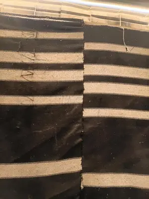 a close up of a black and white blanket at Rum Towers Luxury Camp in Aqaba