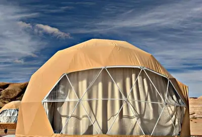 a dome tent in the middle of the desert at Wadi Rum Guide , Luxury Camp