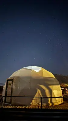 a large white domed object on top of a building at The Red Rock Camp in Wadi Rum