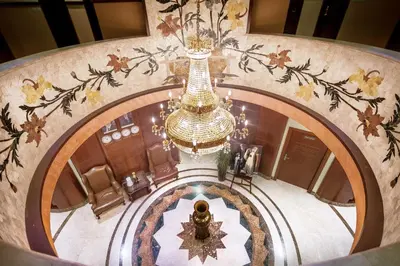 an overhead view of a building with a chandelier at Sofia Hotel in Amman