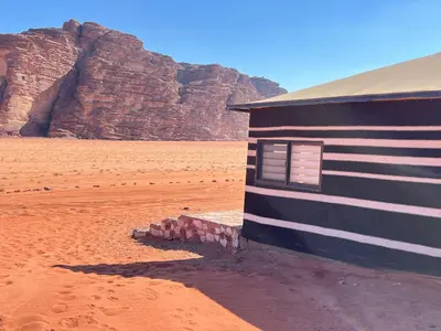 a building in the middle of the desert at Milky Way Bedouin Camp in Wadi Rum