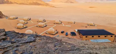 an aerial view of a compound in the desert at Hasan Zawaideh luxury camp 2 in Wadi Rum