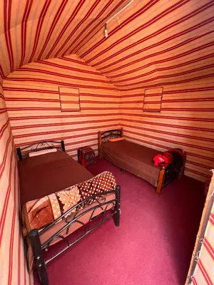 an overhead view of a room with two beds at Wild of Wadi Rum in Wadi Rum