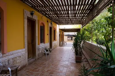 an empty hallway of a building with a wooden ceiling at Darna Divers Village in Aqaba