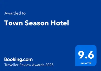 a screenshot of the town season hotel with the text upgraded to town season hotel at Town Season Hotel in Wadi Musa