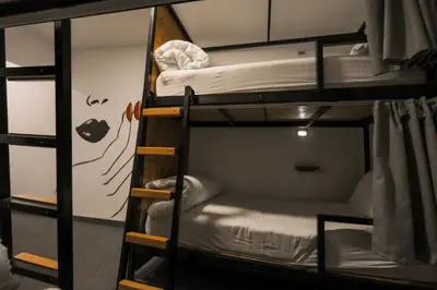 a group of bunk beds in a room at Nomads Hotel in Amman
