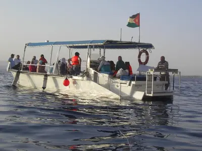 a group of people on a boat in the water at Cedar Hotel in Aqaba