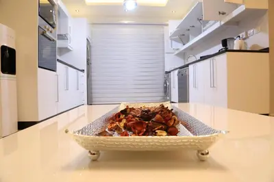 a bowl of food on a counter in a kitchen at Western Gate Residence 2 Amman in Amman