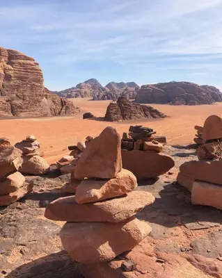 a pile of rocks in the desert at Wadi Rum Bubble Camp in Wadi Rum