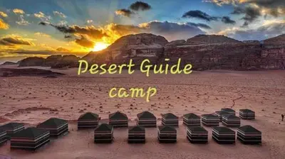 a group of beds on a beach at sunset at Desert guide camp in Wadi Rum