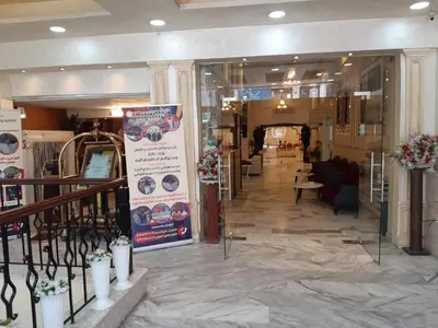 a lobby of a building with a store at Amman Ambiance Hotel in Amman